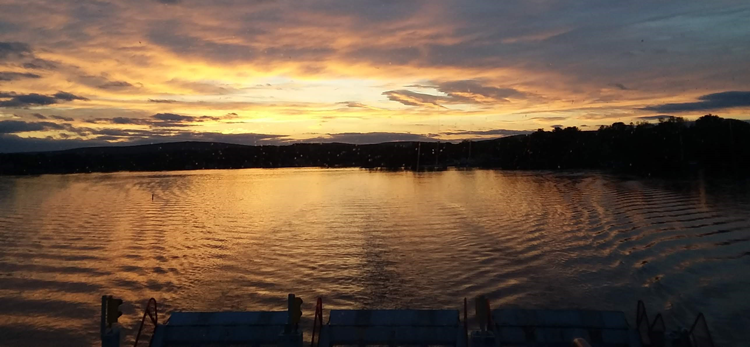 Graphic of Merrimac Ferry Sunset taken by Virgina Staveness